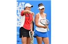 BIRMINGHAM, ENGLAND - JUNE 15:  Ashleigh Barty (L) and Casey Dellacqua of Australia confer during the Doubles Final during Day Seven of the Aegon Classic at Edgbaston Priory Club on June 15, 2014 in Birmingham, England.  (Photo by Tom Dulat/Getty Images)